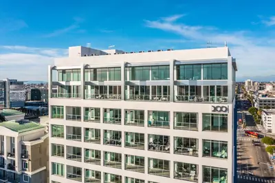an office building with a lot of windows at @ Marbella Lane - Grand 2BR w/ Beach & Ocean Views in Long Beach
