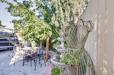 a bunch of potted plants on the side of a wall at Los Angeles Apartment with Patio, 4 Mi to Downtown! in Los Angeles