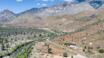 an aerial view of a valley in the mountains at Corral Creek Lodge in Kernville