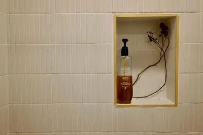 a soap dispenser on a wall in a bathroom at Hollywood Hills Haven-Guest House in Los Angeles