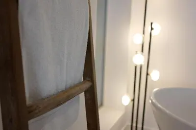 a bathroom with a shower curtain and a sink at Skyline Serenity Luxe Suite-Private Room in Los Angeles