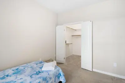 a bedroom with a bed and an open door at Sunny Living l Walk to the Marina in Los Angeles