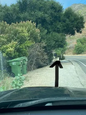 a black arrow on the hood of a car at Malibu Ranch Guest House Hideway in Malibu