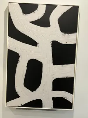 a picture of a painting in a frame on a wall at The Verna Mae in Los Angeles