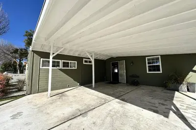 a garage with awning on top of a house at Valley Glen Getaway in Van Nuys