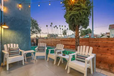 a group of chairs and a table on a patio at Peace palace in Los Angeles