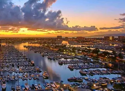 a group of boats docked in a marina at sunset at Spacious 2 Bedroom Venice Beach Villa in Los Angeles