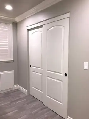 an empty room with a white door and a window at New! Modern Gated Summer Getaway Home in Rosemead