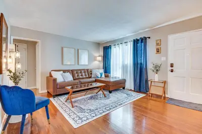 a living room with a couch and a table at 1 Mi to Shopping and Dining Central Burbank Duplex in Burbank