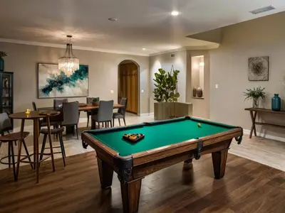 a living room with a pool table in it at Spacious Disney Retreat with Pool Table Fire Pit in Placentia