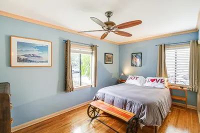 a bedroom with a bed and a ceiling fan at Gardena Vacation Rental 5 Mi to Manhattan Beach! in Gardena