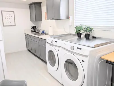 a kitchen with a washing machine and a sink at 5 Mins to DT Alhambra - Homey 2BR Apt 4A in Alhambra