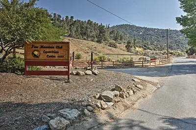 a sign on the side of a road at Pine Mountain Club Cabin with Private Deck and Views! in Pine Mountain Club
