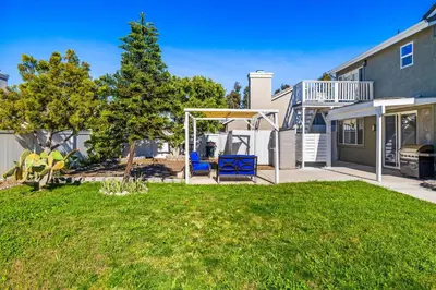 a yard with a gazebo and a swing at Olivia Oasis in Oxnard