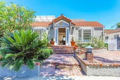 a house with a staircase in front of it at Large 5 BR- Beverly Hills Adj in Los Angeles