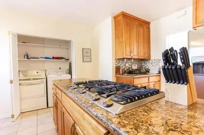 a kitchen with a stove top on a counter at Large 5 BR- Beverly Hills Adj in Los Angeles