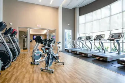 a gym with treadmills and elliptical machines at Playa Vista 1BR w Pool Gym Spa nr the beach LAX-138 in Los Angeles