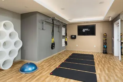 a room with a gym with a blue ball and a yoga mat at Playa Vista 1BR w Pool Gym Spa nr the beach LAX-138 in Los Angeles