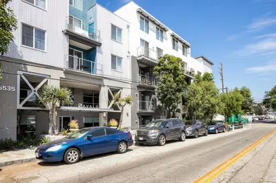 a row of cars parked in front of a building at Playa Vista 1BR w Pool Gym Spa nr the beach LAX-138 in Los Angeles