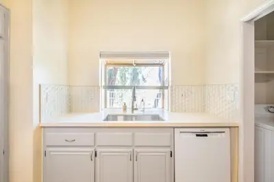 a kitchen with a sink and a window at Thousand Oaks 2br near shopping dining bars LAX-1157 in Oak Park