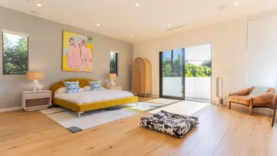 a bedroom with a king sized bed and a couch at Luxe WeHo Villa Walk to Melrose Ave Pool Hot Tub North Vista by AvantStay in Los Angeles