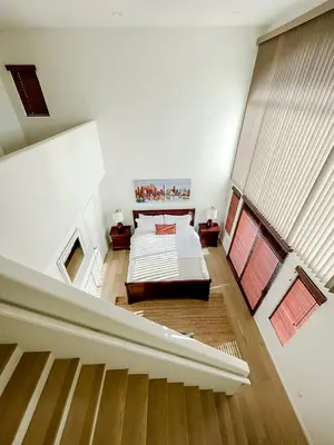 a large white room with a bed in it at *WEHO/Beverly Hills* Luxury 2BD/2.5BA + Balconies in Los Angeles