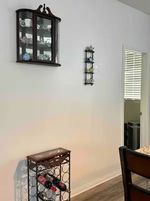 a room with a wine rack on a wall at 3 Bedroom Townhome with Large Living Area in Downey
