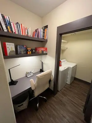 an office with a desk with a chair and a computer at Luxury Modern Condo 3-min from Six Flags w/PS5, 1GB Fast Wi-fi Kingbed in Santa Clarita