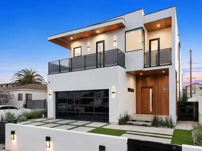 a white house with a large front yard at The Penmar Retreat - Luxurious resort-style oasis in Los Angeles
