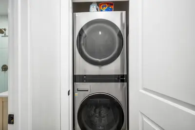 a washer and dryer in a small room at 130 Anderson St A in Sunset Beach