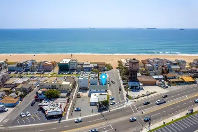 an aerial view of a city and the beach at 130 Anderson St A in Sunset Beach