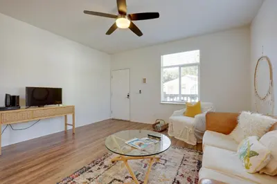 a living room with a couch and a table at Charming Oak View Retreat about 5 Mi to Ojai Valley! in Oak View