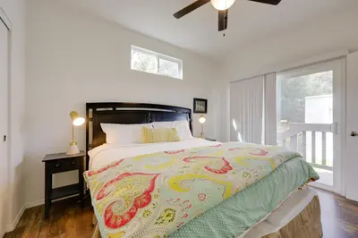 a bedroom with a large bed and a window at Oak View Vacation Rental about 3 Mi to Lake Casitas! in Oak View