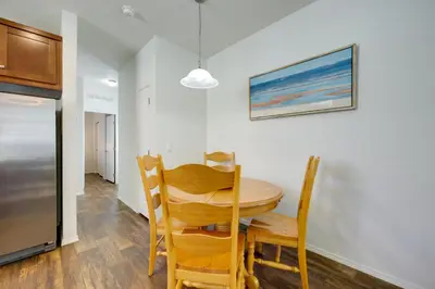 a kitchen and dining room with a table and chairs at Oak View Home with Private Covered Patio! in Oak View