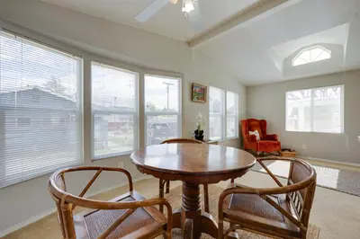 a dining room with a table and two chairs at Oak View Home - Close to Beaches and Trails! in Oak View