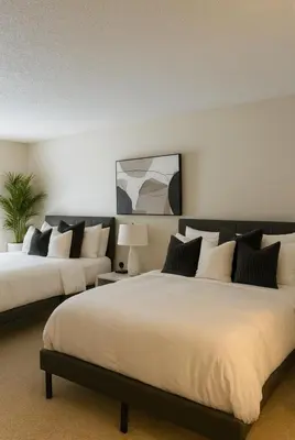 a bedroom with two large beds at Partial Ocean View Steps to the Pier in Los Angeles