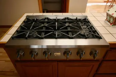 a stove top oven sitting in a kitchen at Outrageous Lake View Villa pets ok in Lake Arrowhead