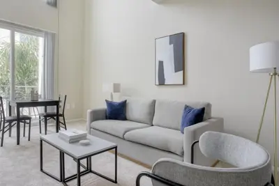 a living room with a couch and a table at Playa Vista 1br w gym pool table nr beach LAX-1123 in Los Angeles