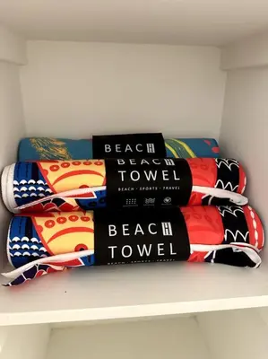 a pile of pillows sitting on a shelf at Luxury 1BR Malibu Bungalow on PCH + steps from Beach! in Malibu