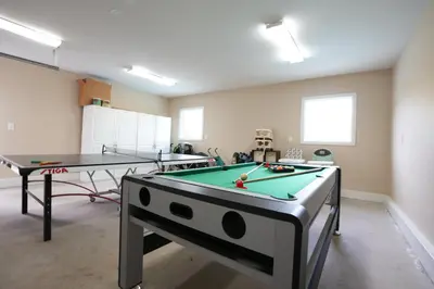 a room with two ping pong tables in it at Destination #06 in Anaheim