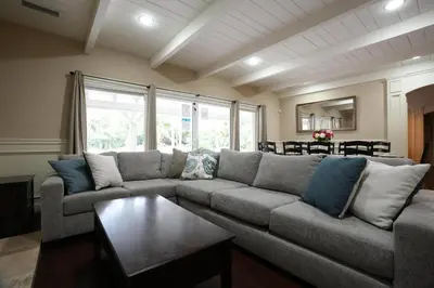 a living room with a couch and a table at Destination #03 in Fullerton