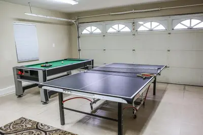 a room with two ping pong tables in it at Destination #10 in Anaheim