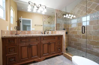 a bathroom with a large sink and a shower at Nostalgic PoolJacuzzi Home: GameRm1.8 Mi 2Disney in Anaheim
