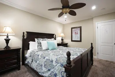 a bedroom with a bed and a ceiling fan at Destination #05 in Anaheim
