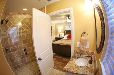 a small bathroom with a sink and a shower at Destination #26 in Anaheim