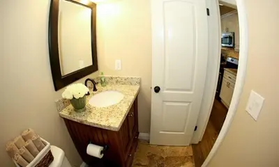 a bathroom with a sink and a mirror at Destination #29 in Anaheim