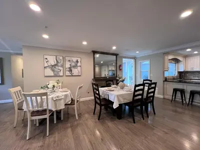 a dining room with a table and chairs at Destination #32 in Anaheim