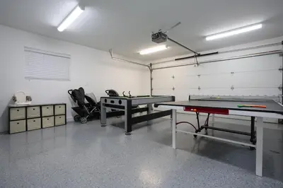 a ping pong room with a ping pong table in it at Destination #39 in Orange