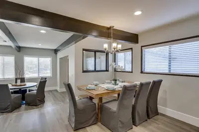 a dining room with a table and chairs at Destination #41 in Fullerton