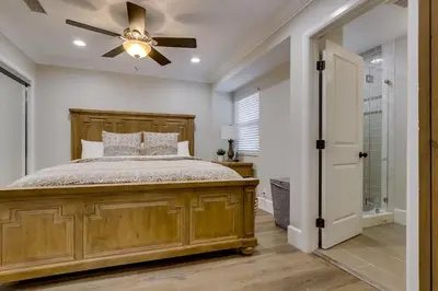 a bedroom with a bed and a ceiling fan at Destination #41 in Fullerton